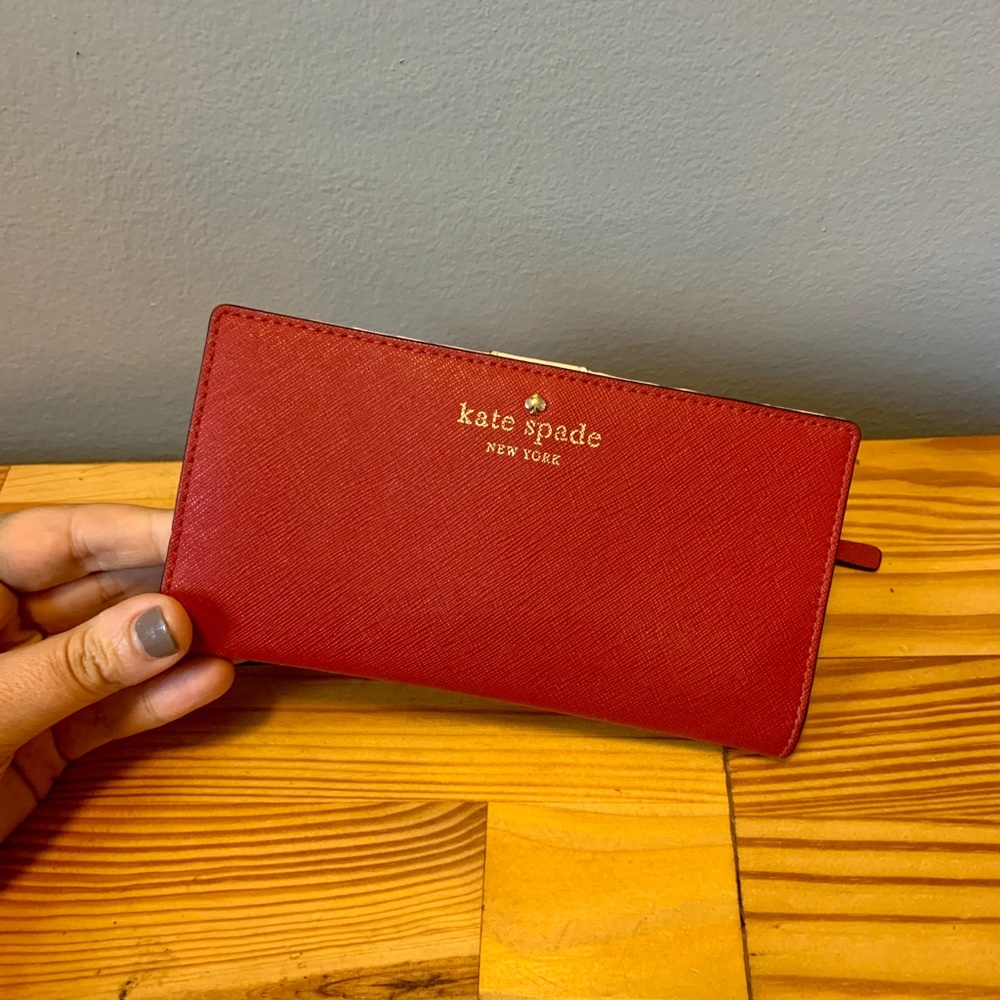 Red kate spade bifold wallet with snap!